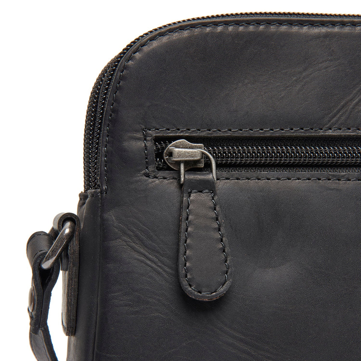 
Vionne Leður crossbody taska - Hliðarsýn sem sýnir dýpt og rúmmál
