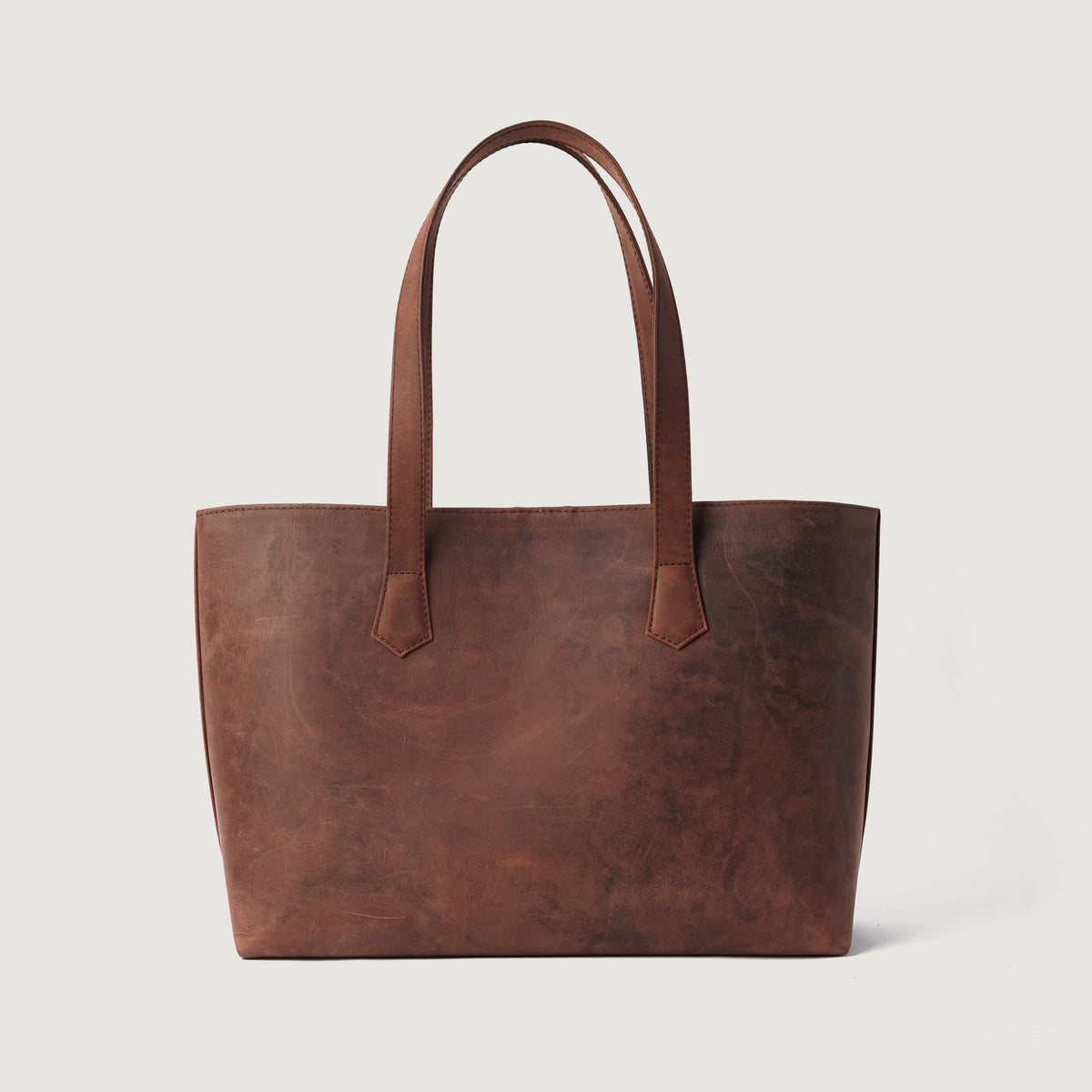 
The Bianca Vintage Distressed Brown Leather Tote Bag For Women - Hliðarsýn sem sýnir dýpt og rúmmál