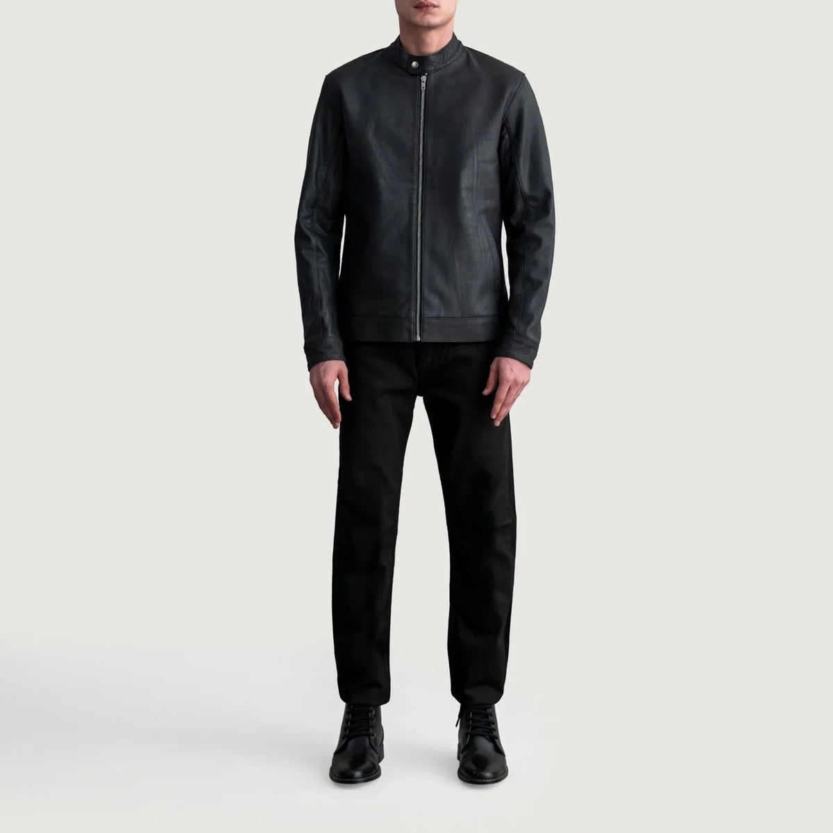 Close-Up Detail of Snap Button &amp; Zipper Hardware on Zen Tumbled Black Leather Biker Jacket